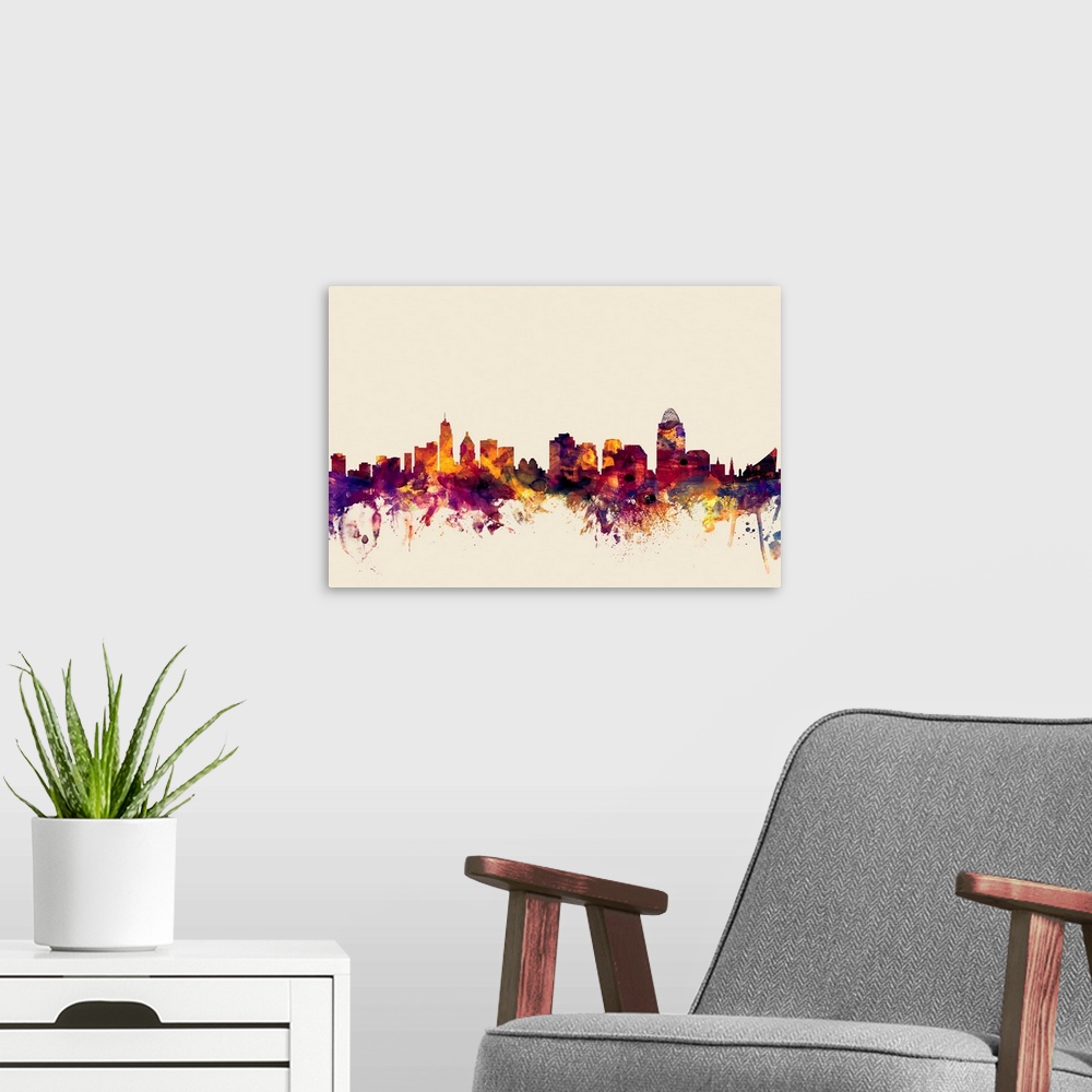 A modern room featuring Watercolor artwork of the Cincinnati skyline against a beige background.