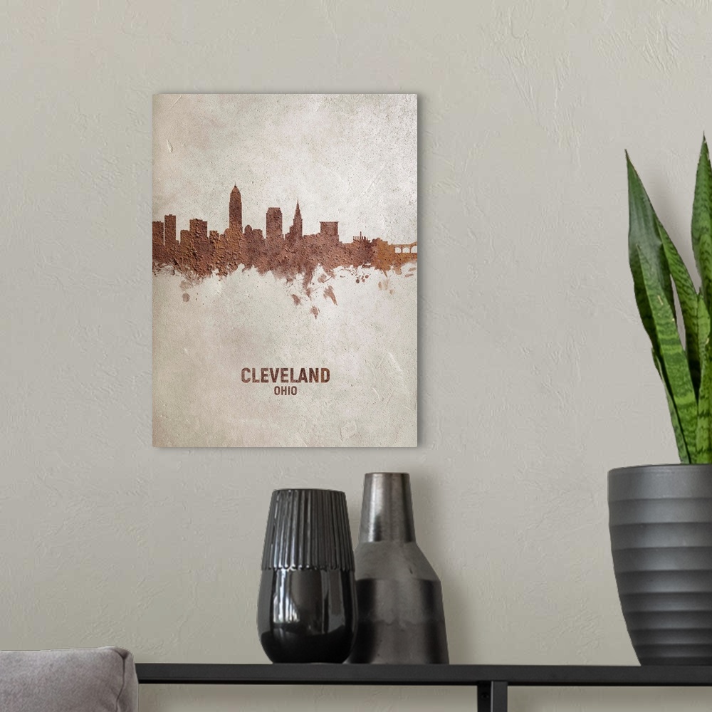 A modern room featuring Art print of the skyline of Cleveland, Ohio, United States. Rust on concrete.