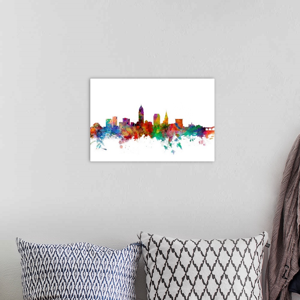 A bohemian room featuring Watercolor artwork of the Cleveland skyline against a white background.