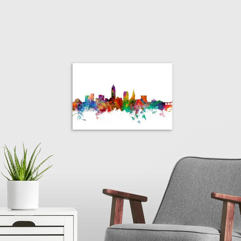 A modern room featuring Watercolor artwork of the Cleveland skyline against a white background.