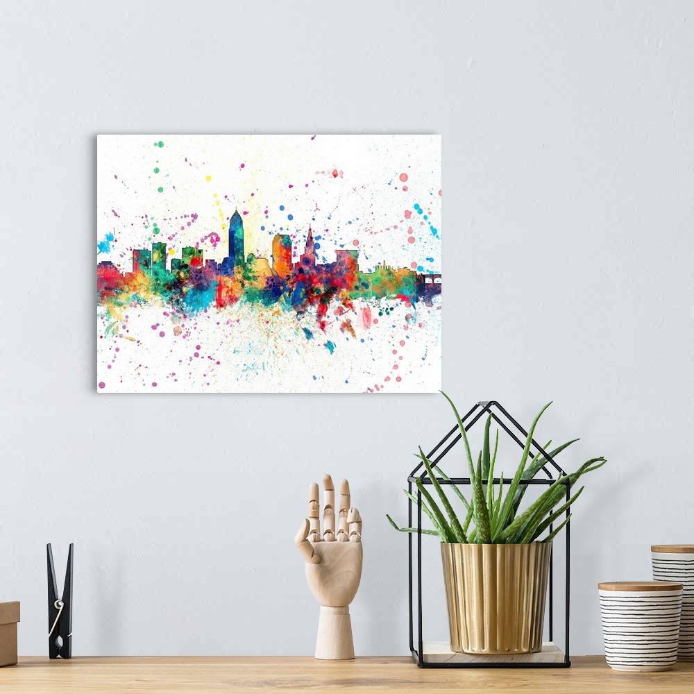 A bohemian room featuring Wild and vibrant paint splatter silhouette of the Cleveland skyline.