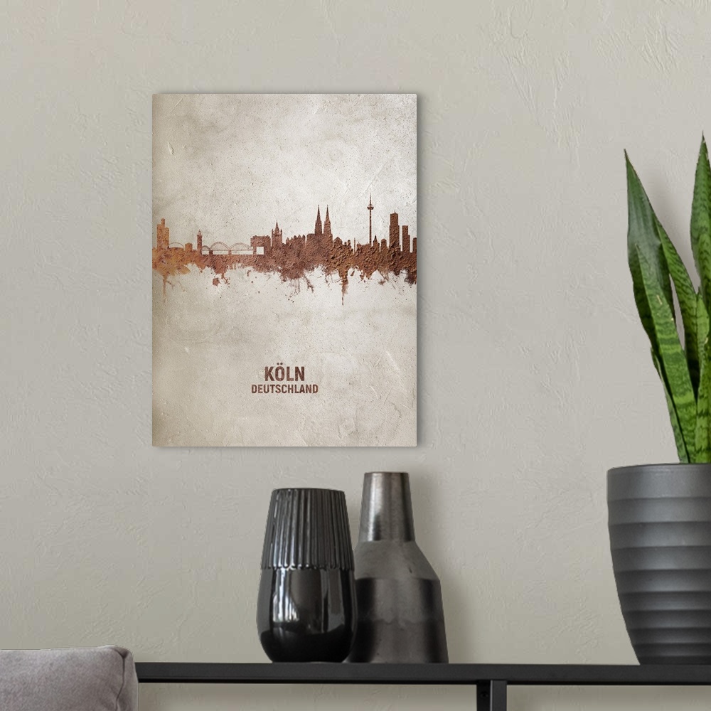 A modern room featuring Art print of the skyline of Cologne, Germany (Koln). Rust on concrete.