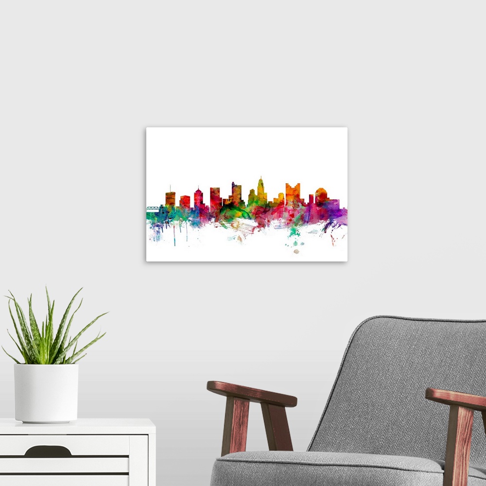 A modern room featuring Watercolor artwork of the Columbus skyline against a white background.
