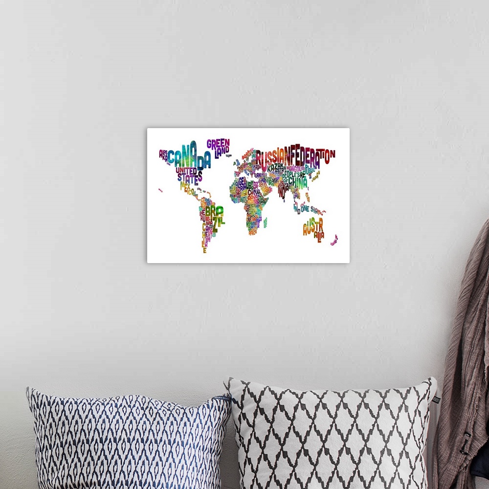 A bohemian room featuring Typography art work of a world map with countries created with their names filling the shape of t...