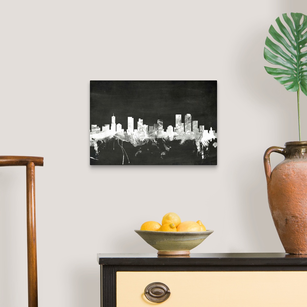 A traditional room featuring Smokey dark watercolor silhouette of the Denver city skyline against chalkboard background.