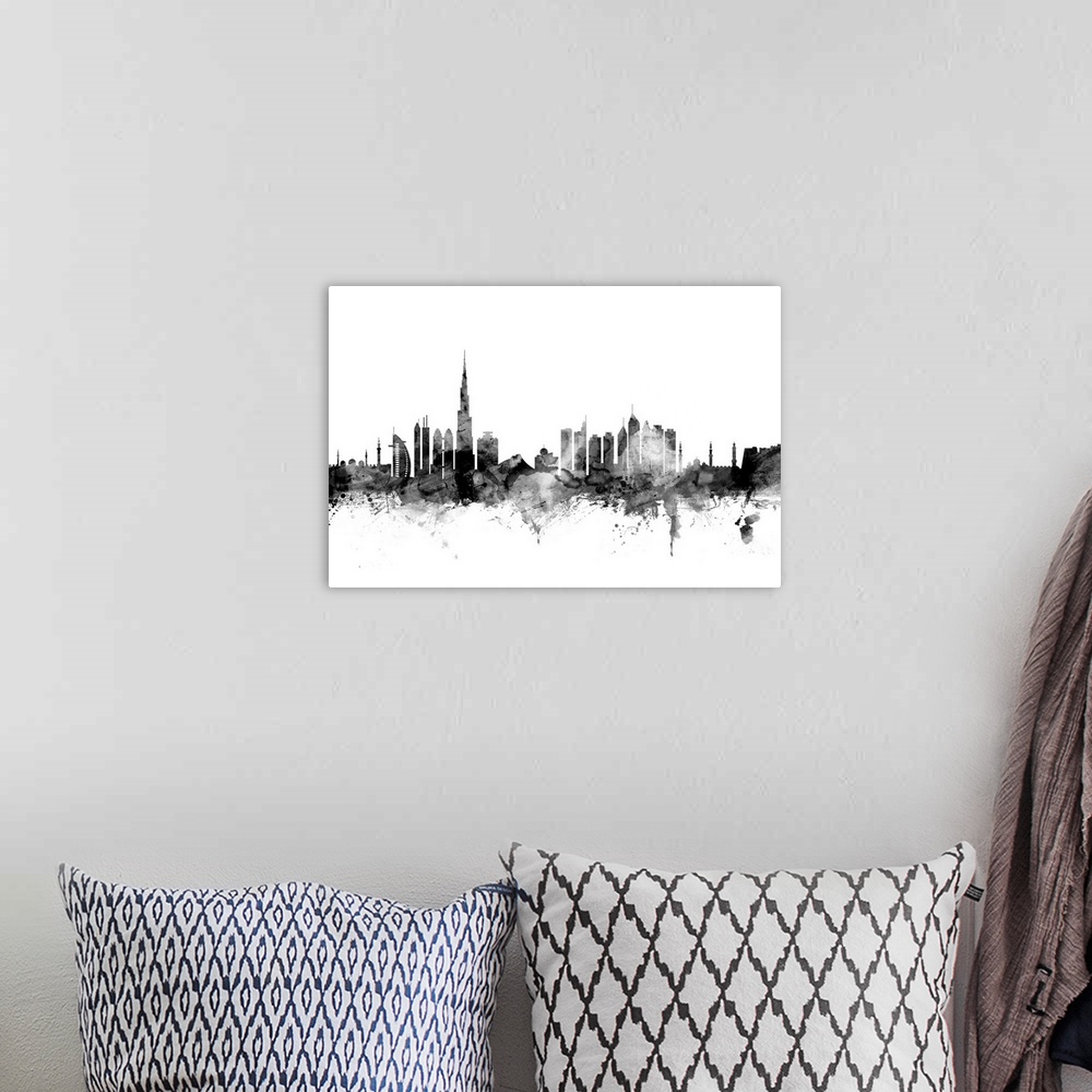 A bohemian room featuring Contemporary artwork of the Dubai city skyline in black watercolor paint splashes.
