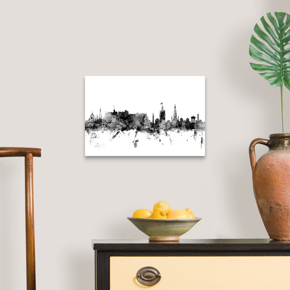 A traditional room featuring Contemporary artwork of the Edinburgh city skyline in black watercolor paint splashes.
