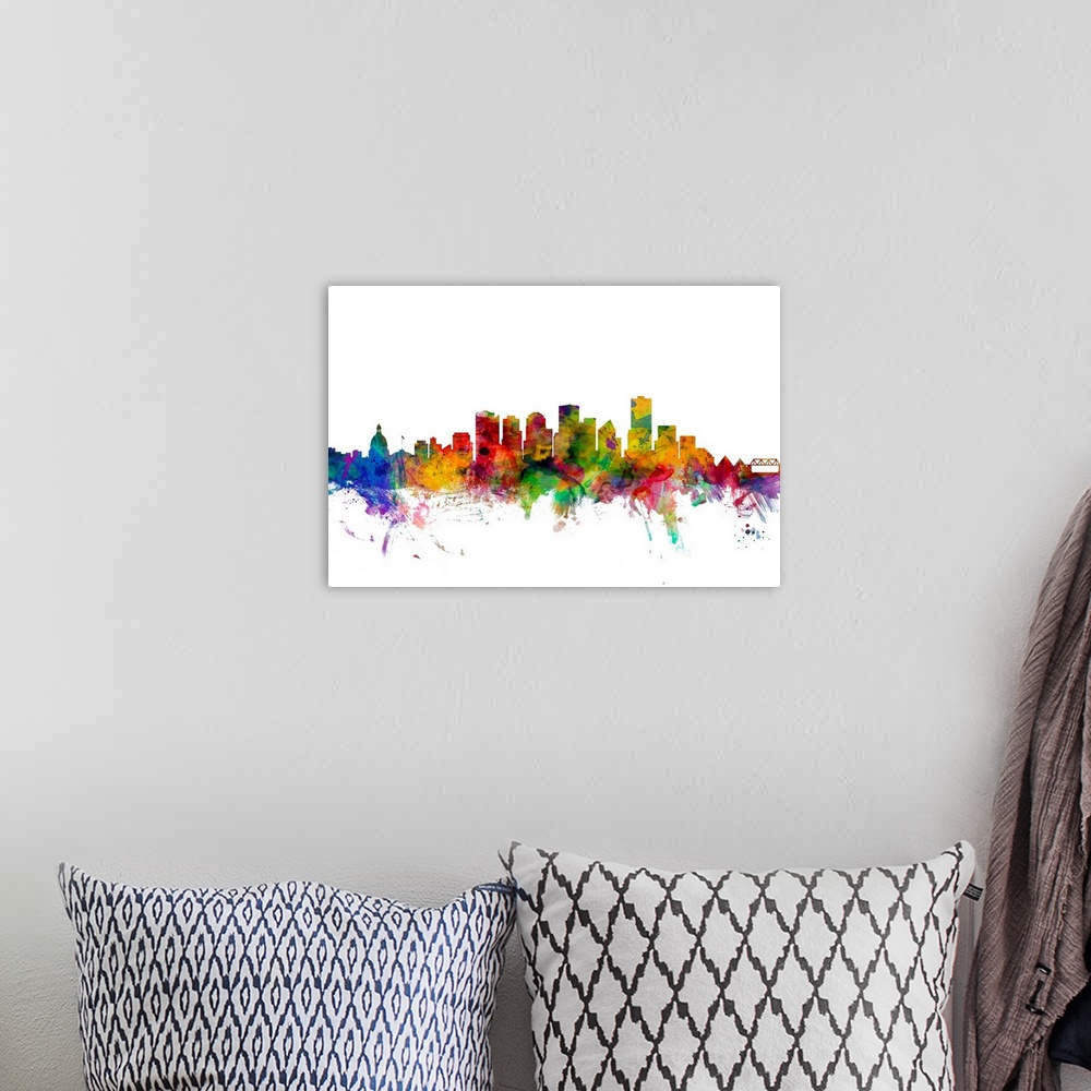 A bohemian room featuring Watercolor artwork of the Edmonton skyline against a white background.