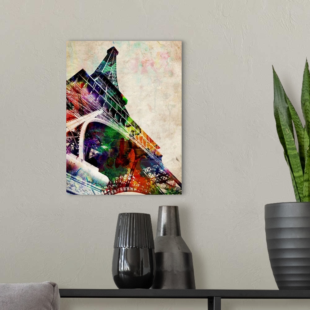 A modern room featuring Contemporary artwork of iconic monument's outline filled overlapping colors bleeding together.