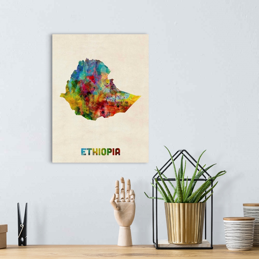 A bohemian room featuring A watercolor map of Ethiopia