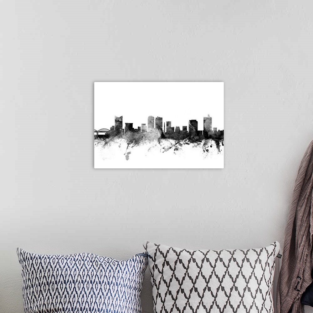 A bohemian room featuring Contemporary artwork of the Fort Worth city skyline in black watercolor paint splashes.