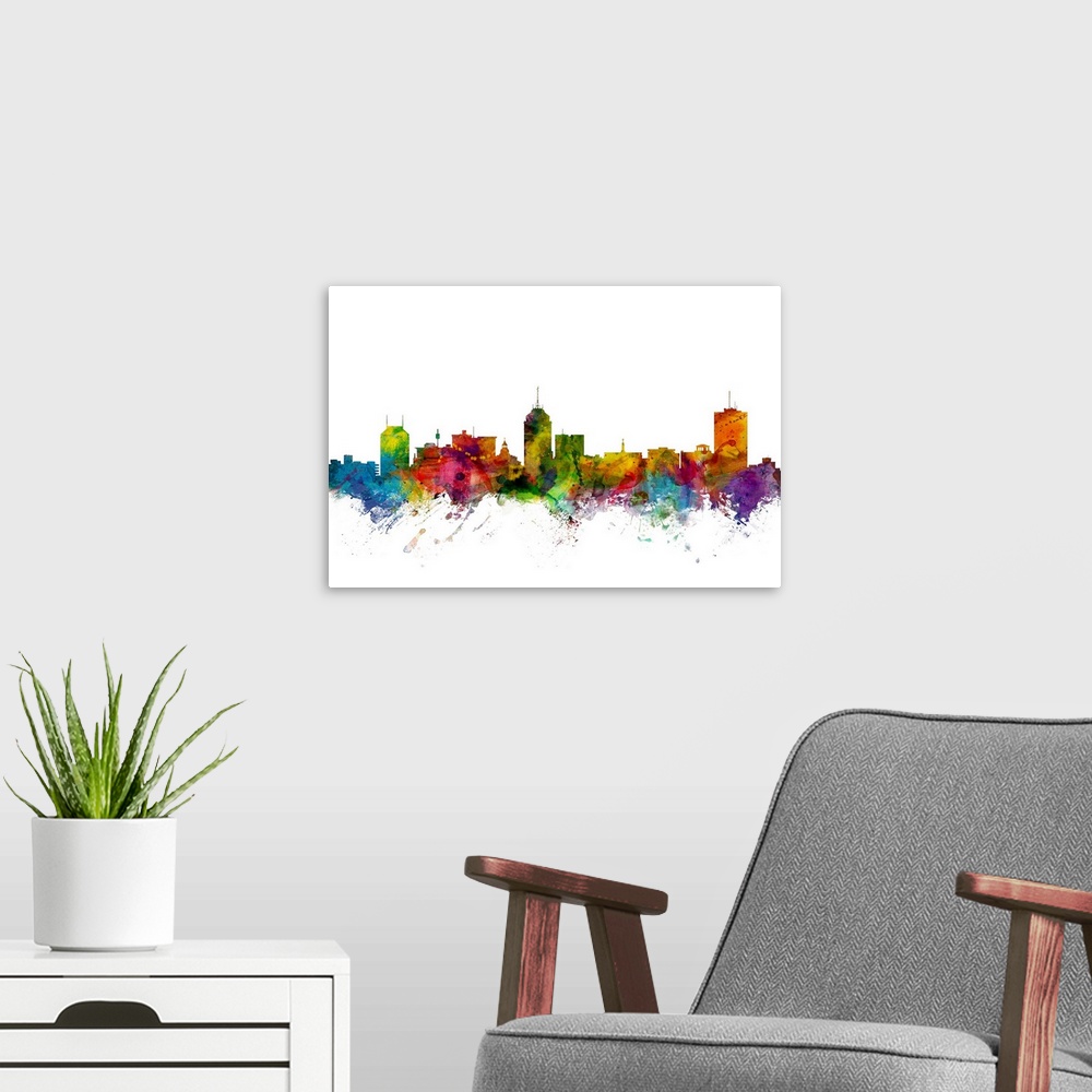 A modern room featuring Watercolor artwork of the Fresno skyline against a white background.