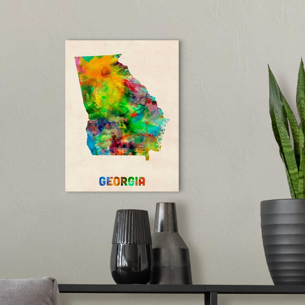 A modern room featuring Contemporary piece of artwork of a map of Georgia made up of watercolor splashes.