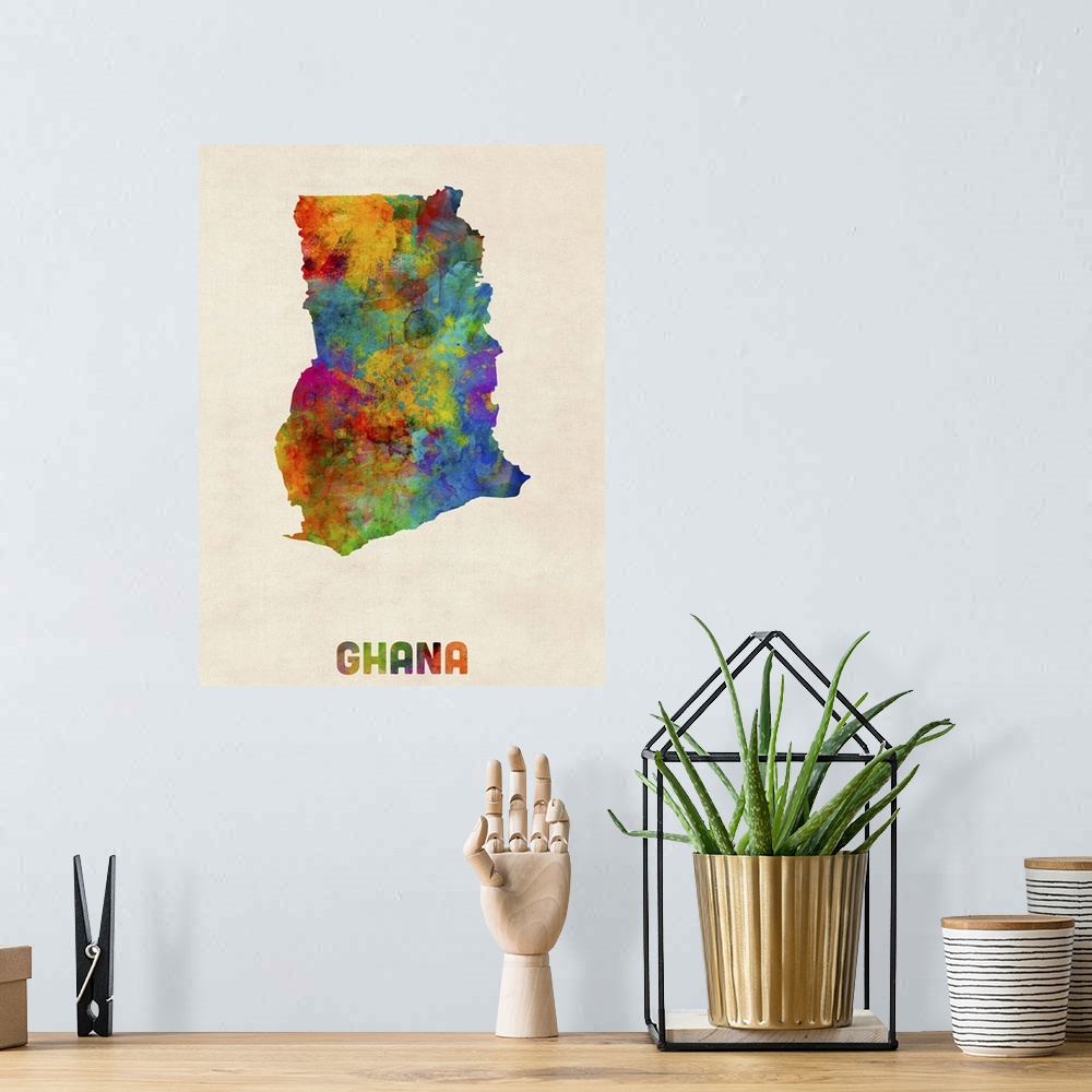 A bohemian room featuring Colorful watercolor art map of Ghana against a distressed background.