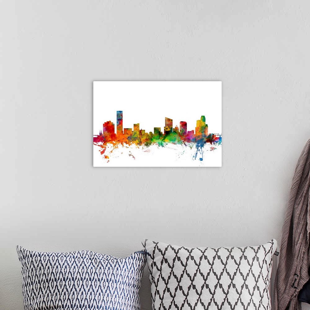 A bohemian room featuring Watercolor artwork of the Grand Rapids skyline against a white background.