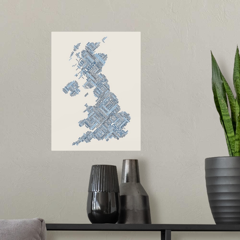 A modern room featuring Contemporary piece of artwork of a map of Great Britain made up of the names of the city names.