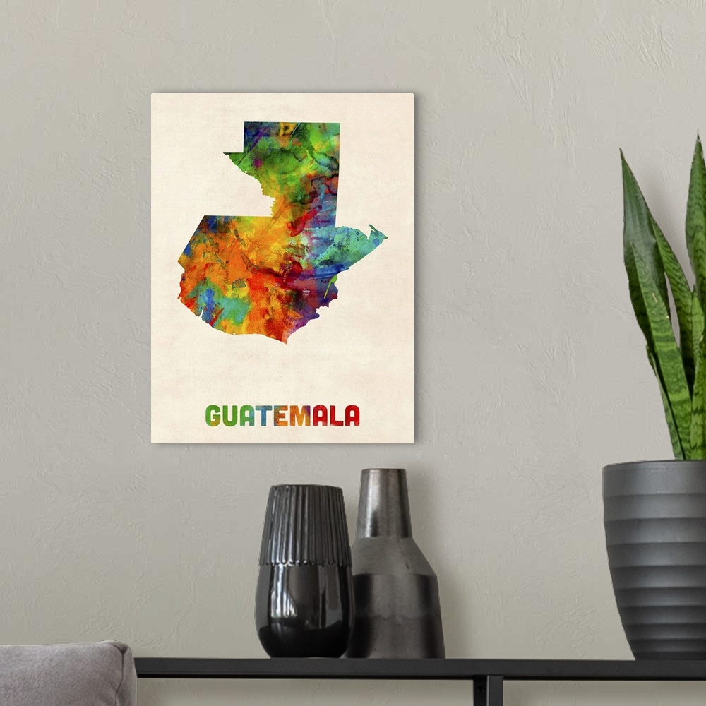 A modern room featuring Watercolor art map of the country Guatemala against a weathered beige background.
