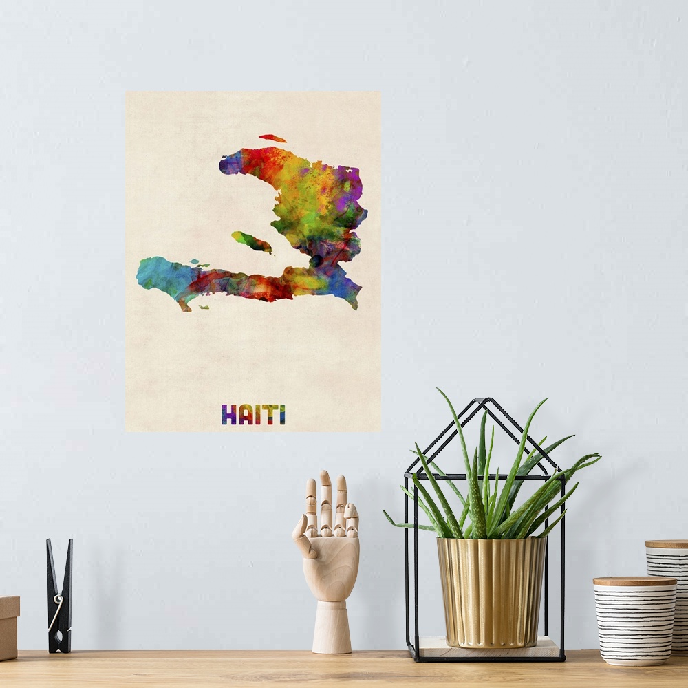 A bohemian room featuring Colorful watercolor art map of Haiti against a distressed background.
