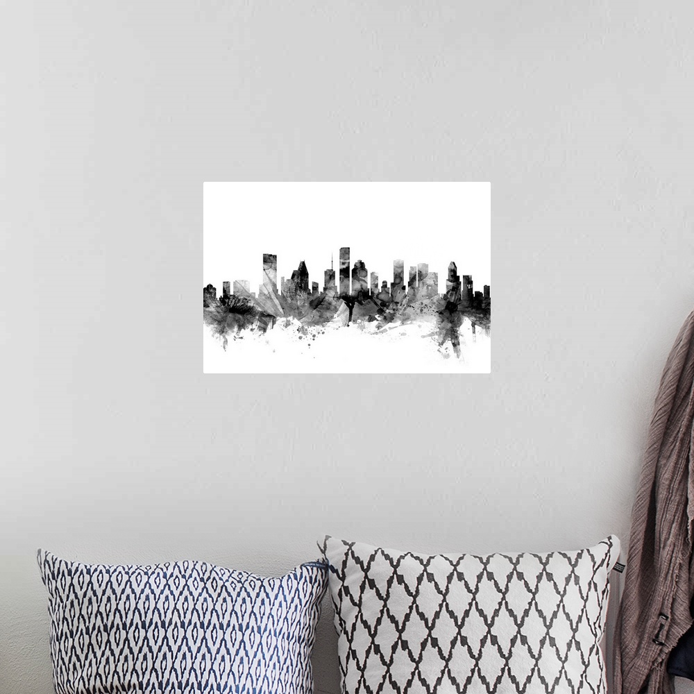 A bohemian room featuring Contemporary artwork of the Houston city skyline in black watercolor paint splashes.