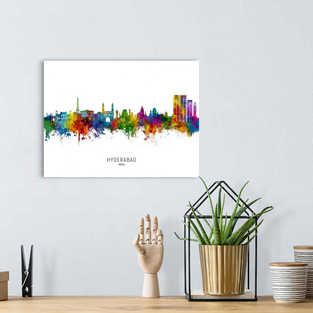 A bohemian room featuring Watercolor art print of the skyline of Hyderabad, India
