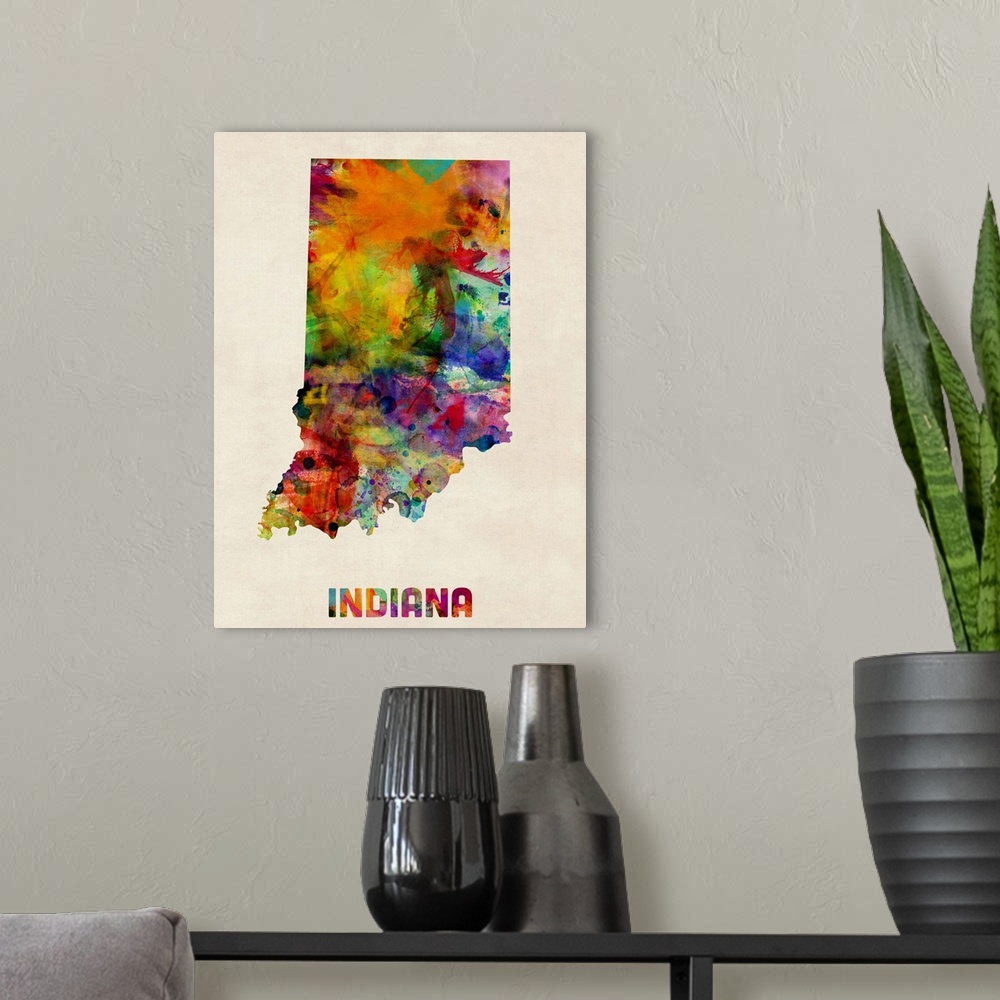 A modern room featuring Contemporary piece of artwork of a map of Indiana made up of watercolor splashes.