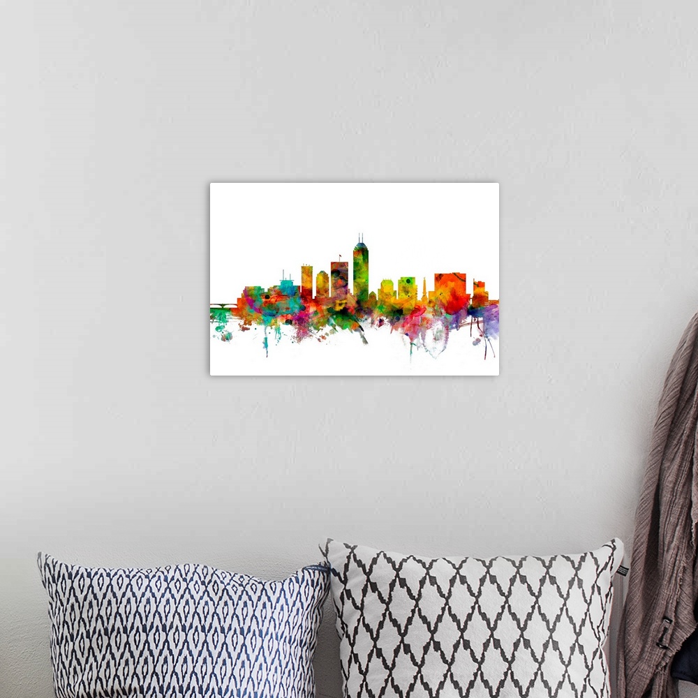 A bohemian room featuring Watercolor artwork of the Indianapolis skyline against a white background.