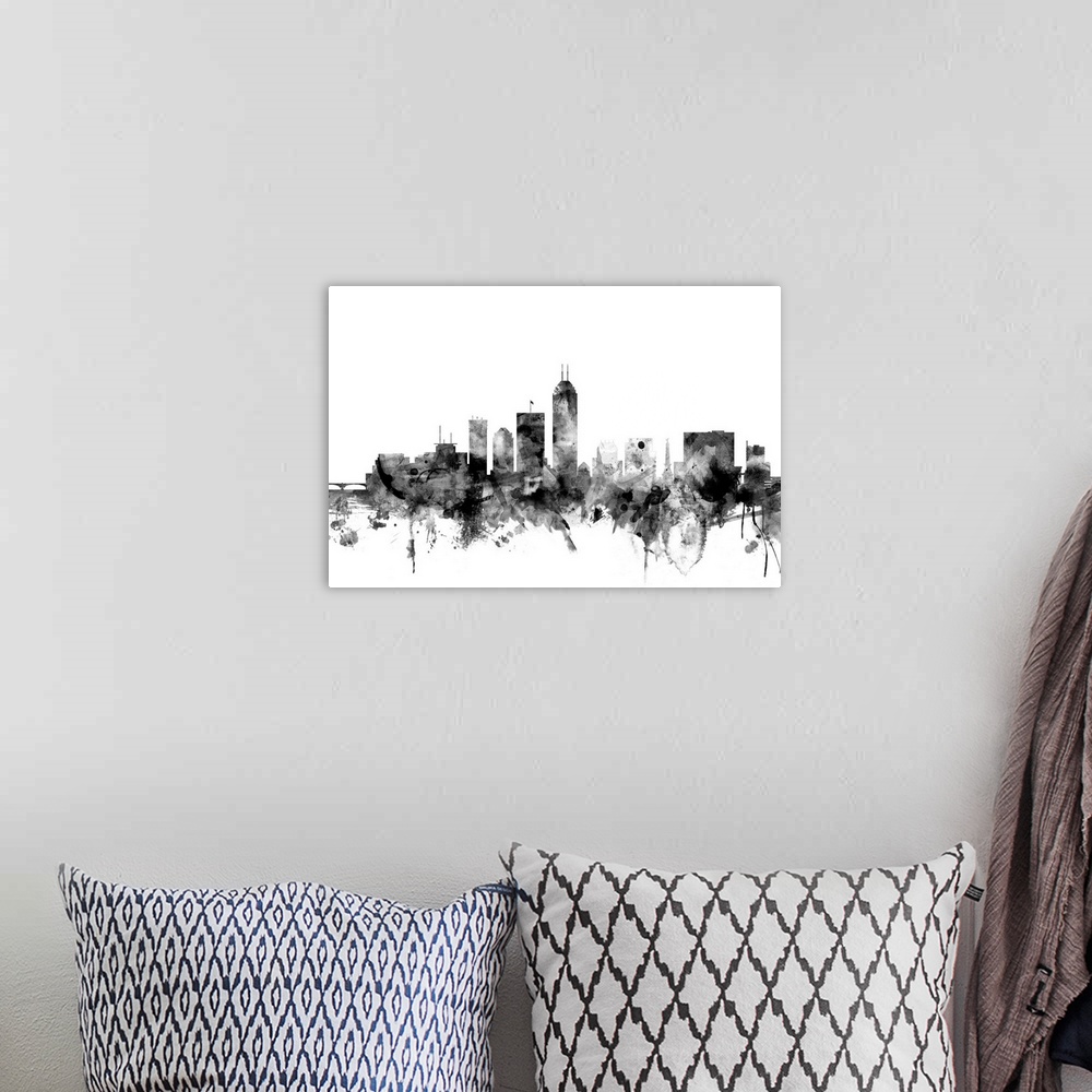 A bohemian room featuring Contemporary artwork of the Indianapolis city skyline in black watercolor paint splashes.