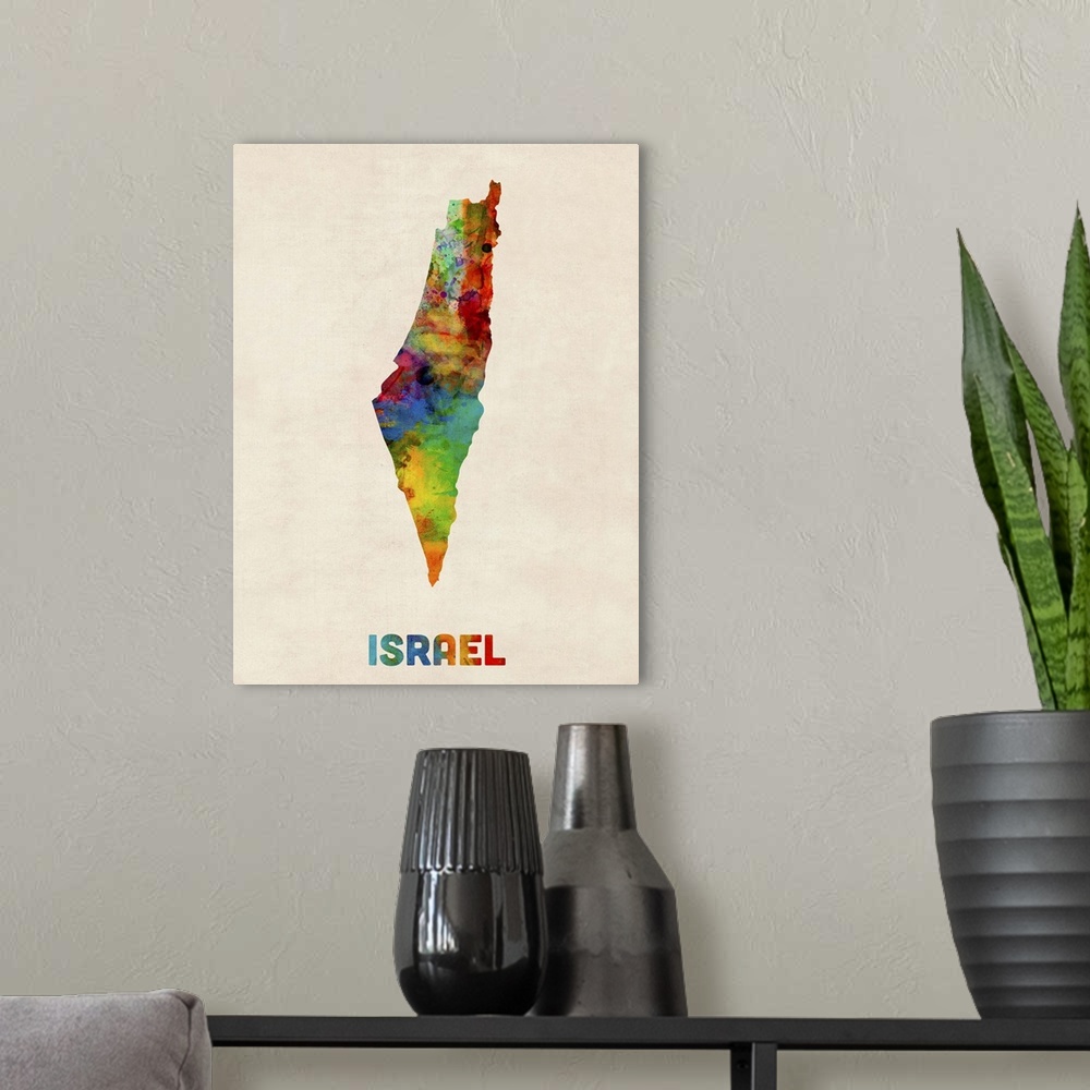 A modern room featuring Contemporary piece of artwork of a map of Israel made up of watercolor splashes.