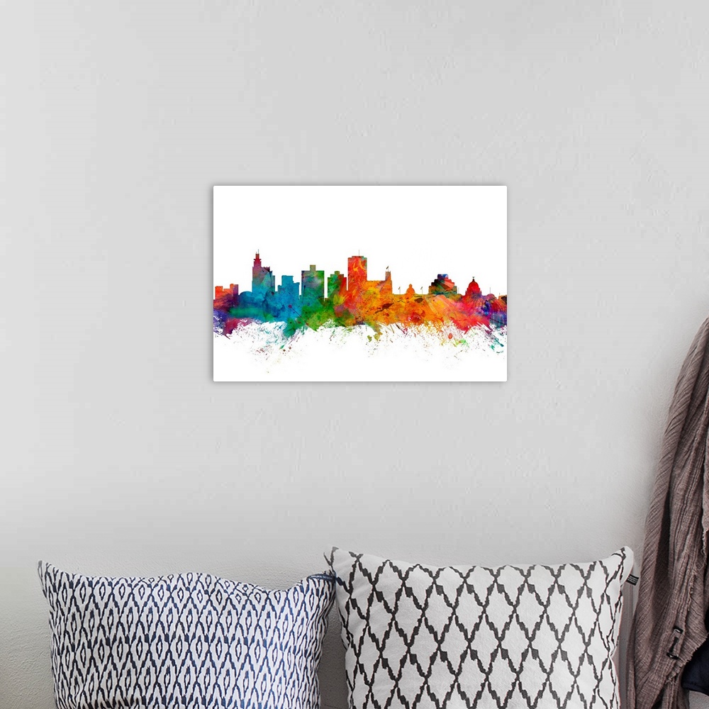 A bohemian room featuring Watercolor artwork of the Jackson skyline against a white background.