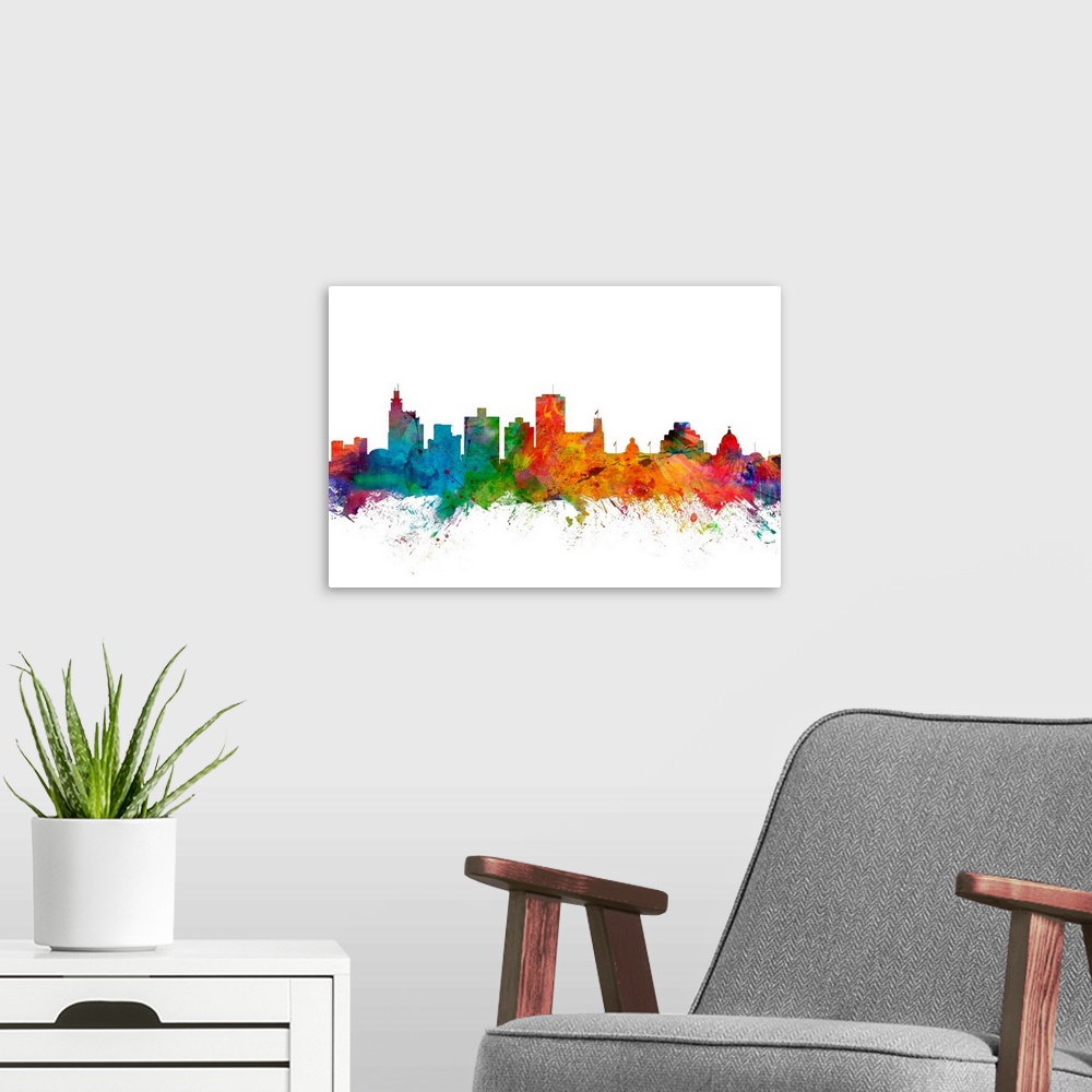 A modern room featuring Watercolor artwork of the Jackson skyline against a white background.