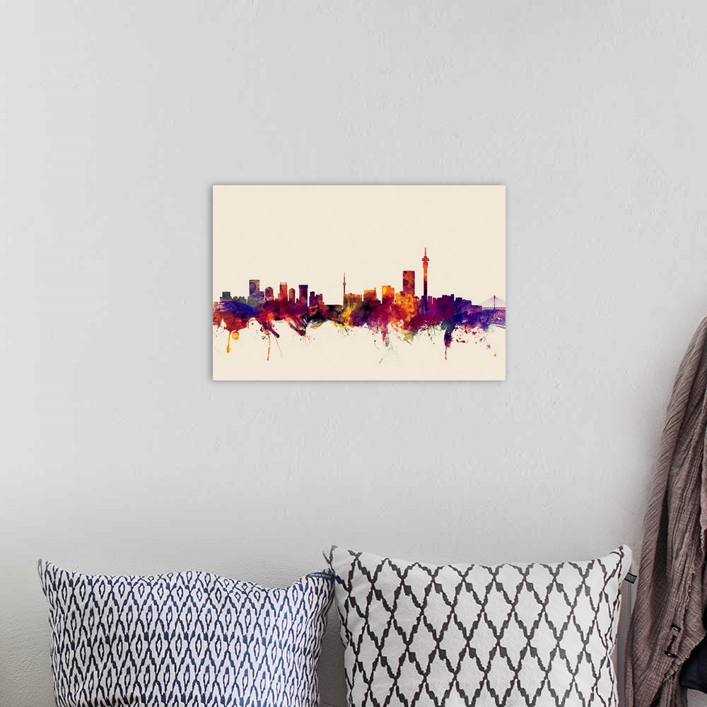 A bohemian room featuring Contemporary artwork of the Johannesburg city skyline in watercolor paint splashes.