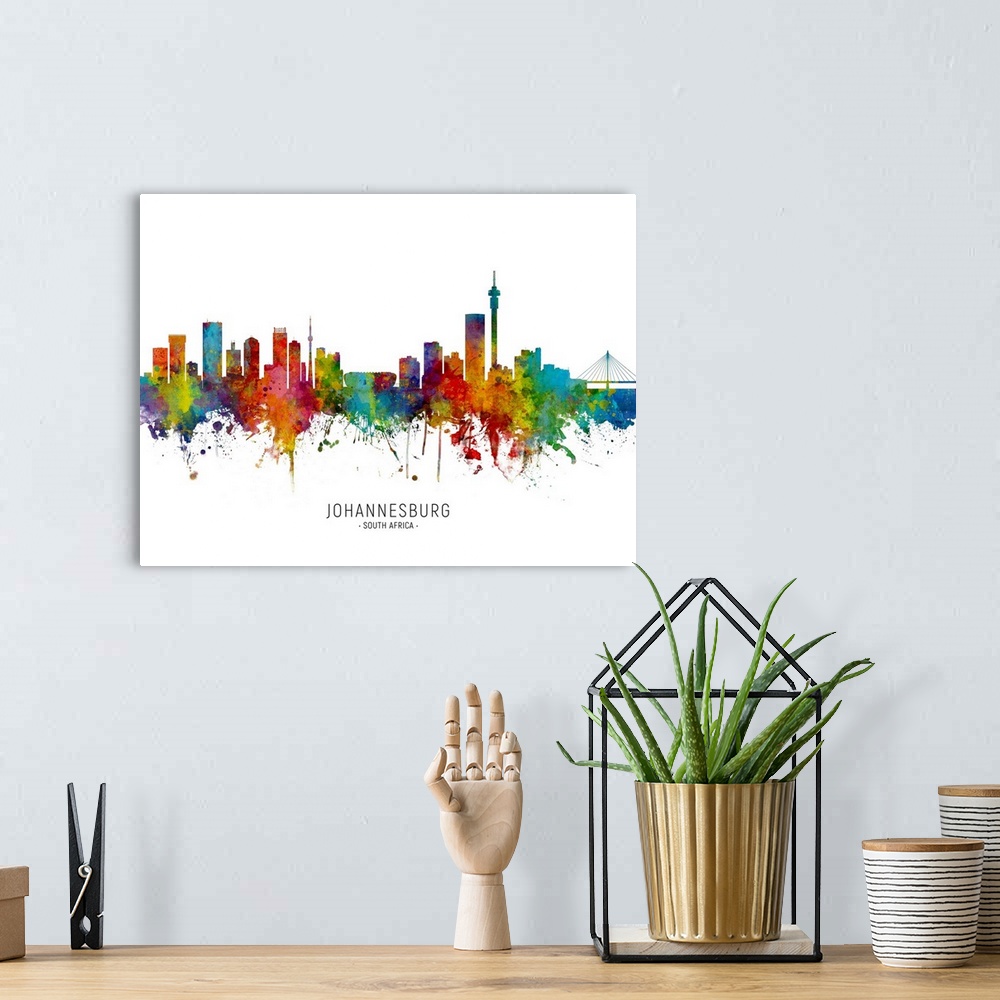 A bohemian room featuring Watercolor art print of the skyline of Johannesburg, South Africa.