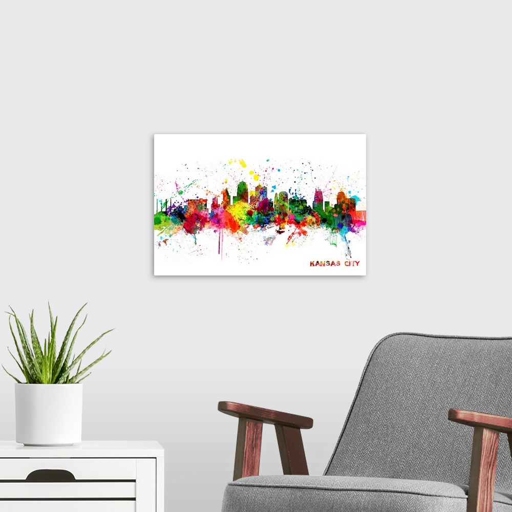 A modern room featuring Contemporary piece of artwork of the Kansas City skyline made of colorful paint splashes.