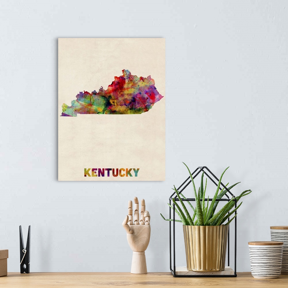 A bohemian room featuring Contemporary piece of artwork of a map of Kentucky made up of watercolor splashes.
