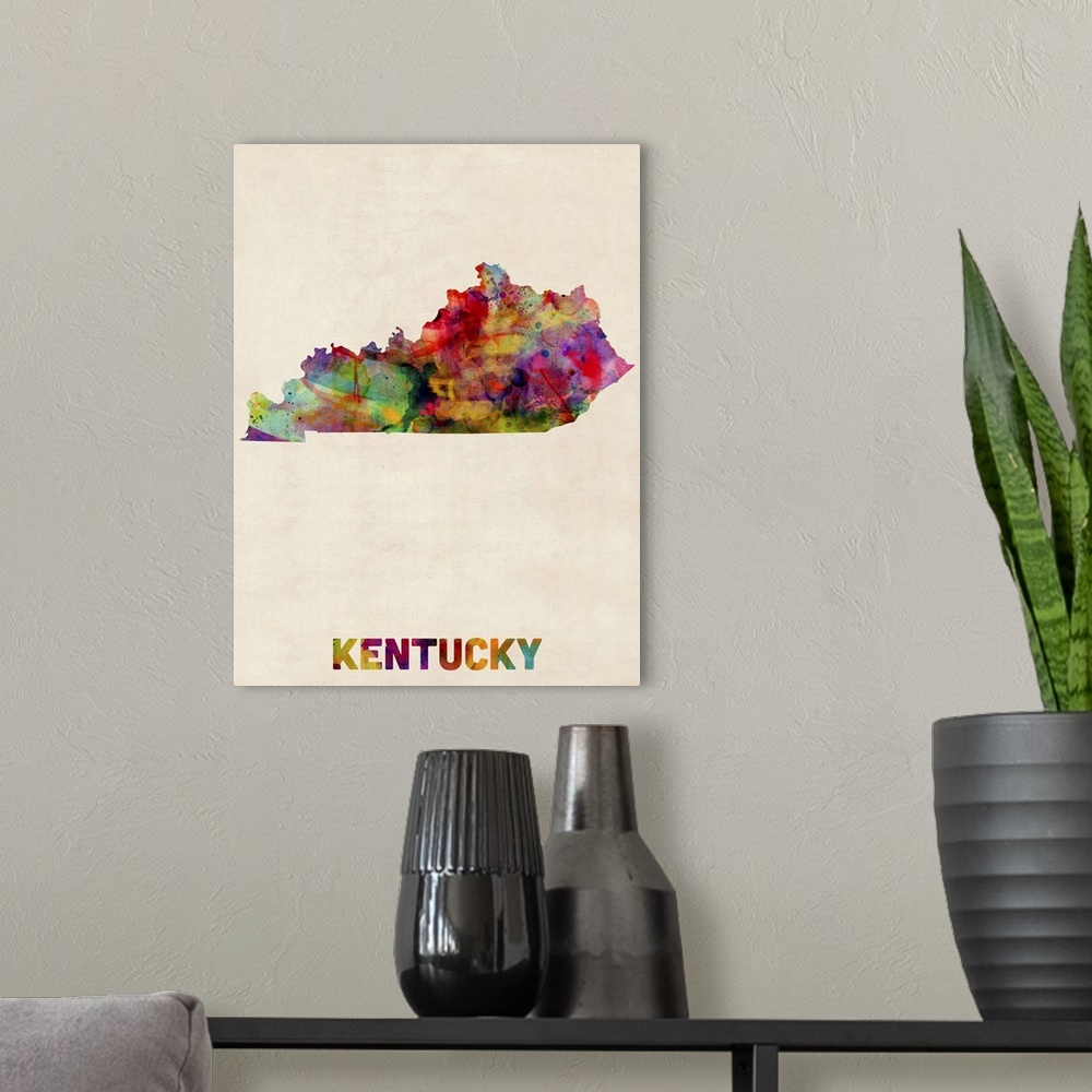 A modern room featuring Contemporary piece of artwork of a map of Kentucky made up of watercolor splashes.