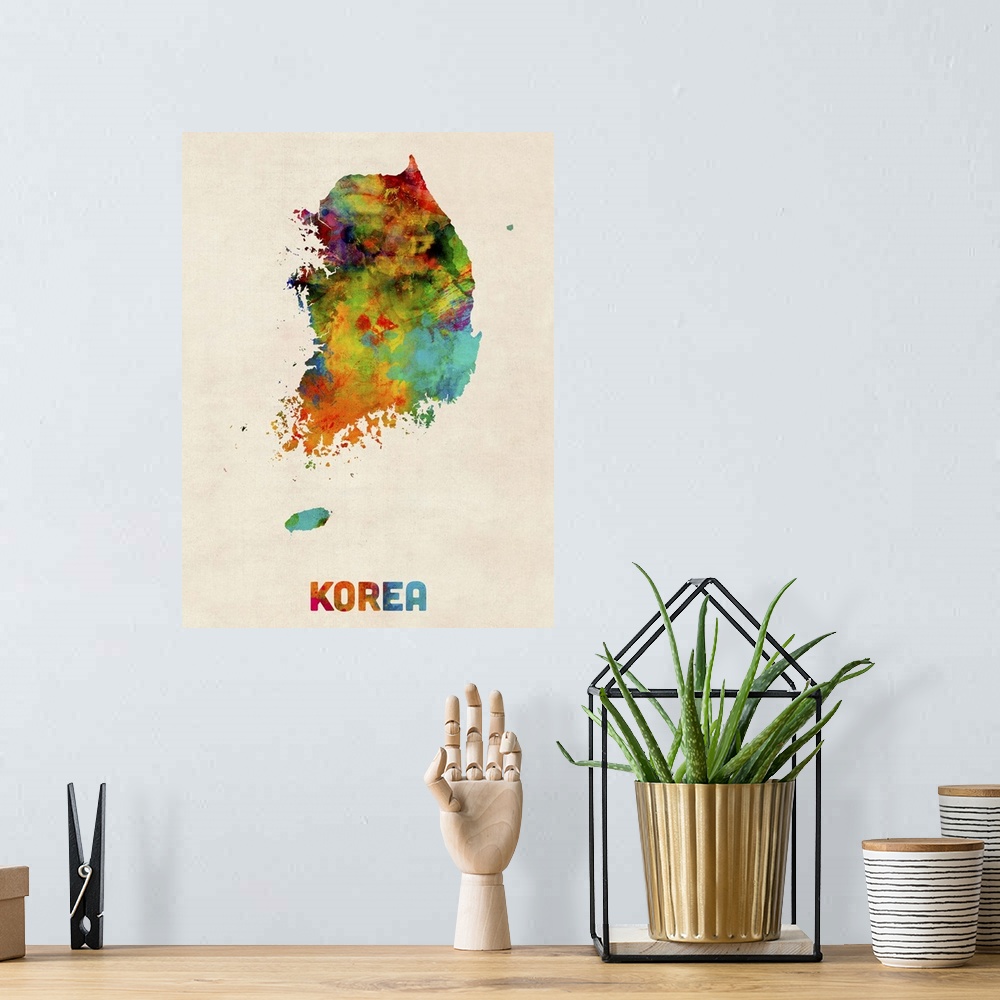 A bohemian room featuring Watercolor art map of the country Korea against a weathered beige background.