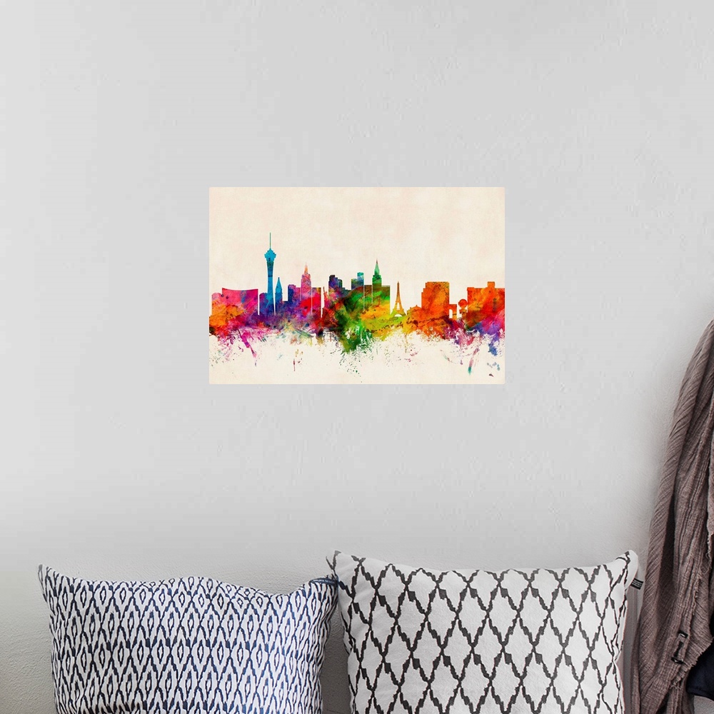 A bohemian room featuring Contemporary piece of artwork of the Las Vegas skyline made of colorful paint splashes.
