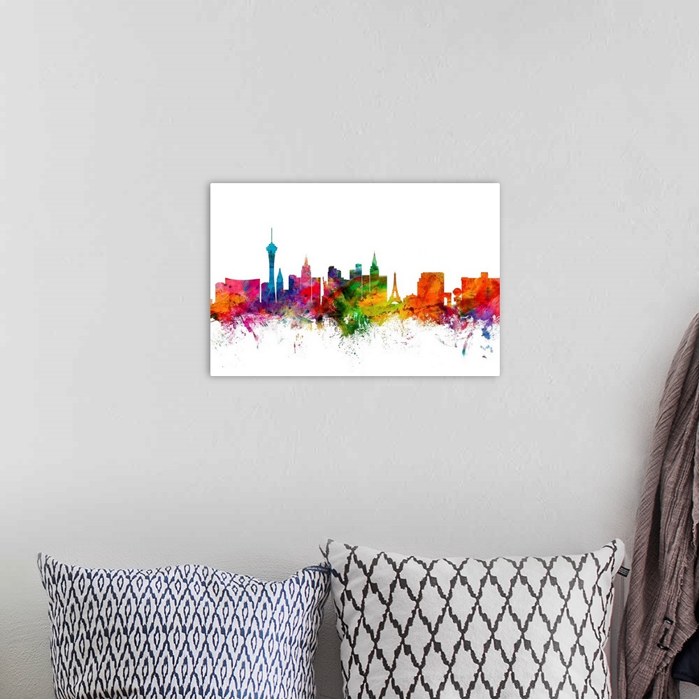 A bohemian room featuring Watercolor artwork of the Las Vegas skyline against a white background.