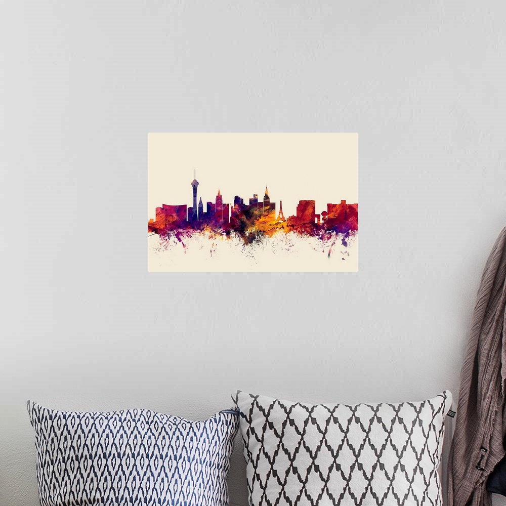 A bohemian room featuring Contemporary artwork of the Las Vegas city skyline in watercolor paint splashes.
