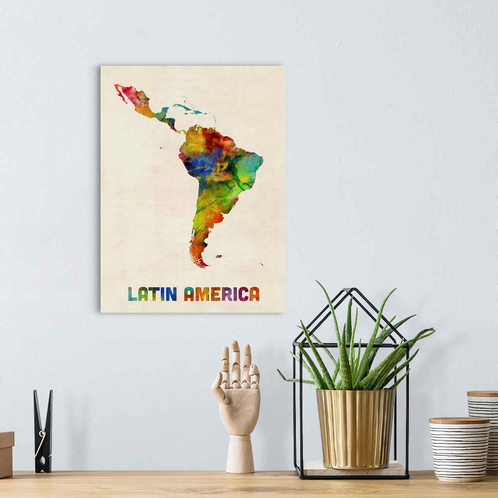 A bohemian room featuring A watercolor map of Central and South America