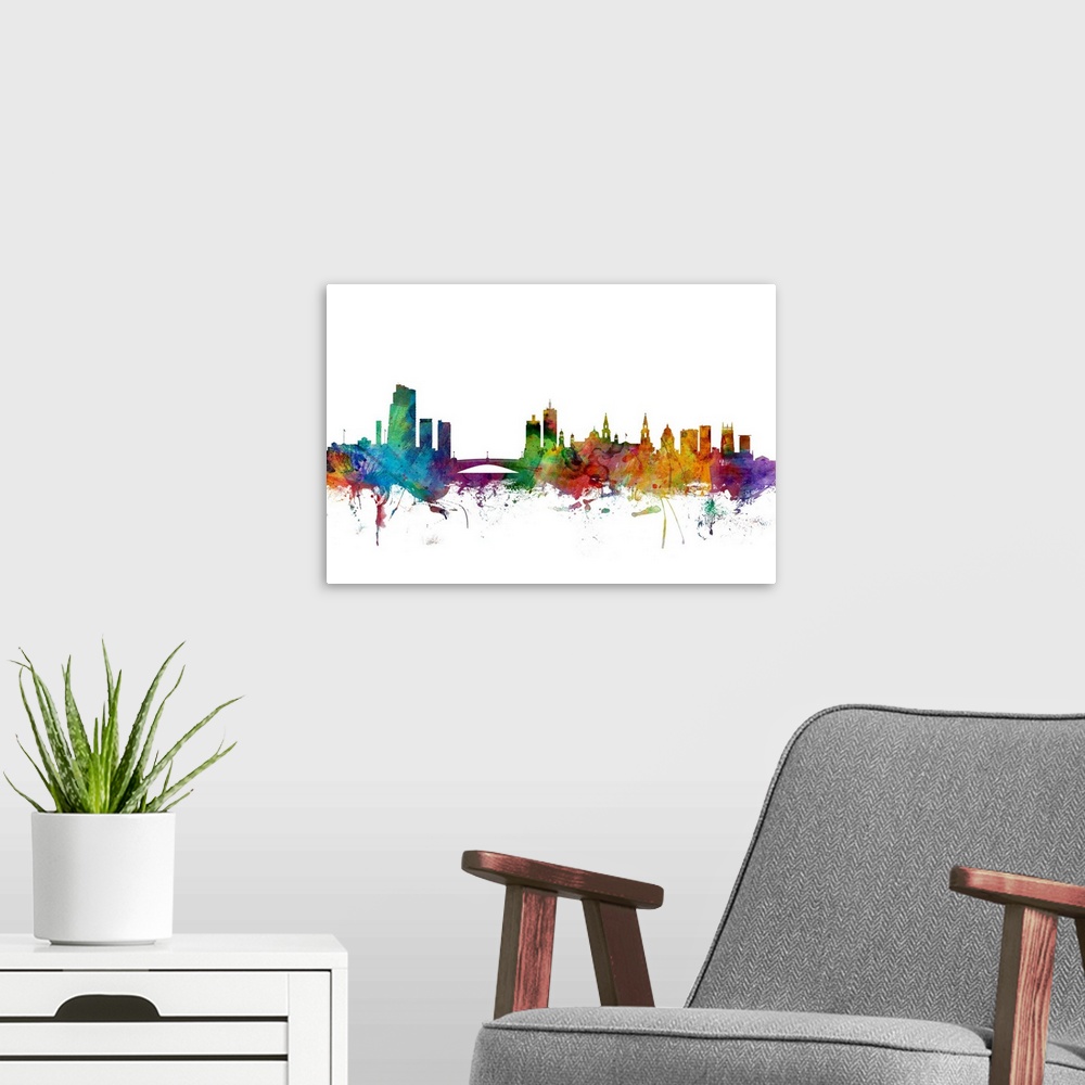 A modern room featuring Contemporary piece of artwork of the Leeds skyline made of colorful paint splashes.