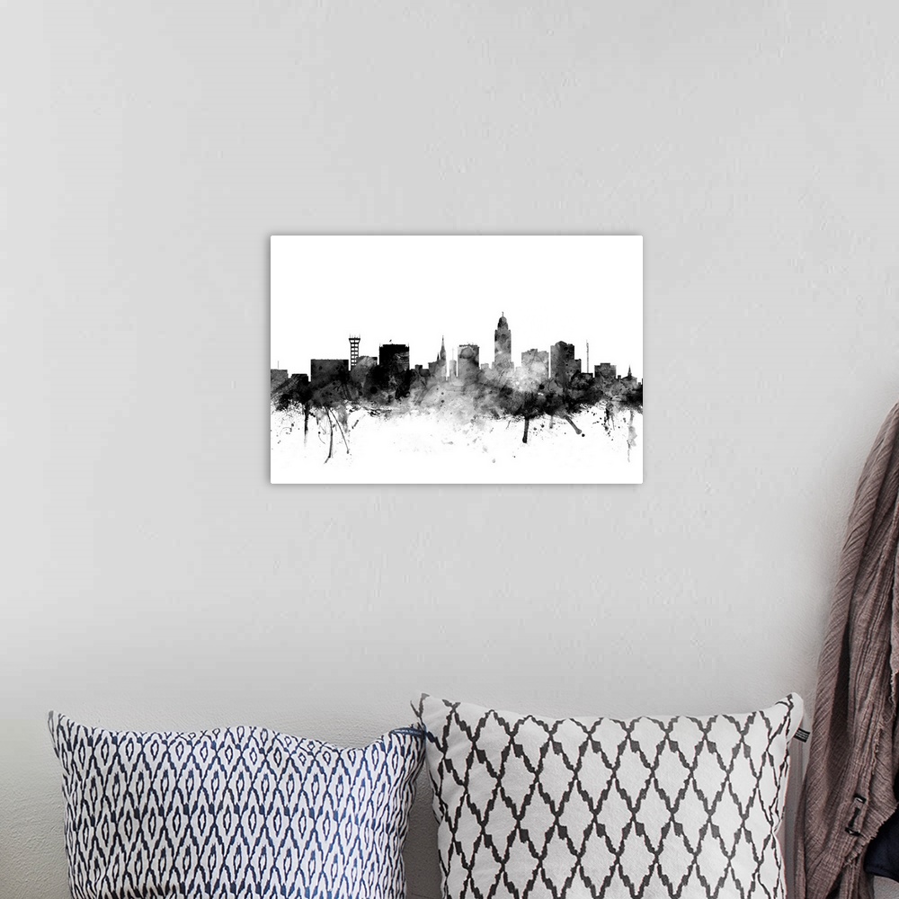 A bohemian room featuring Smokey dark watercolor silhouette of the Lincoln city skyline.
