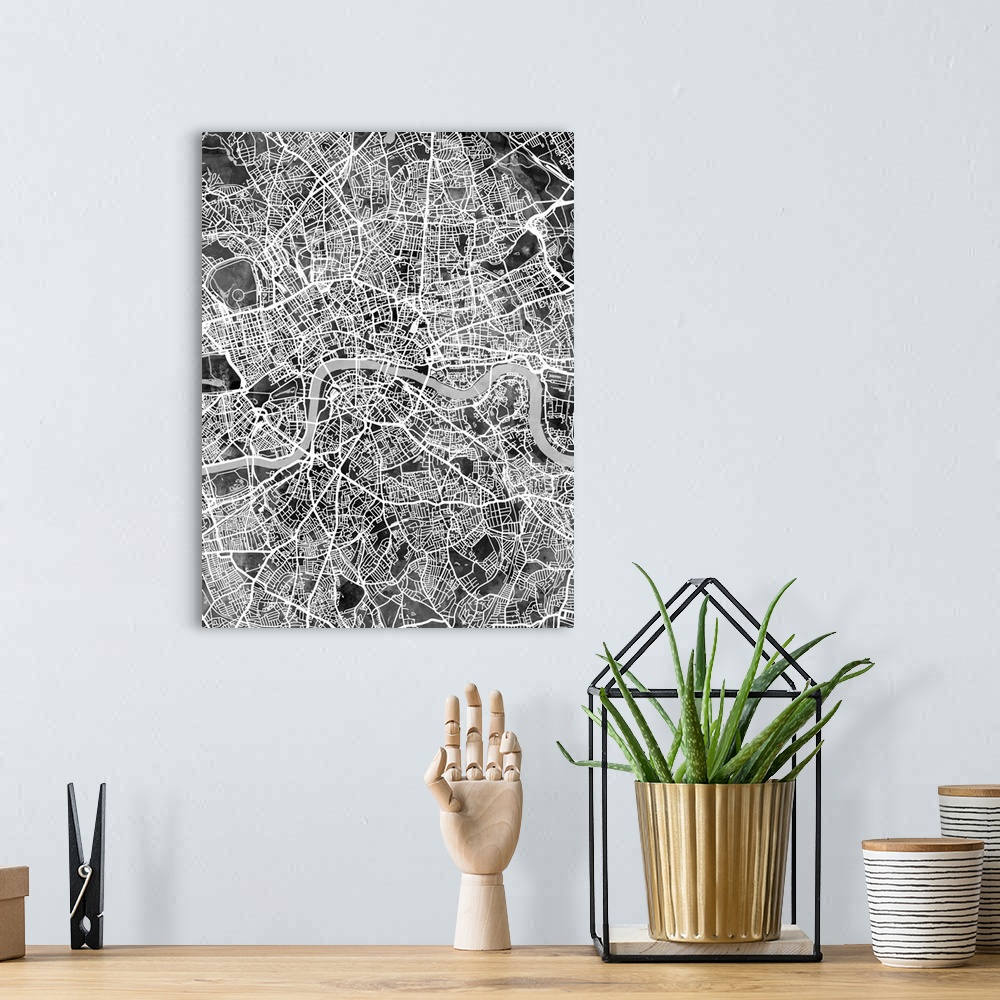 A bohemian room featuring A watercolor street map of London, England