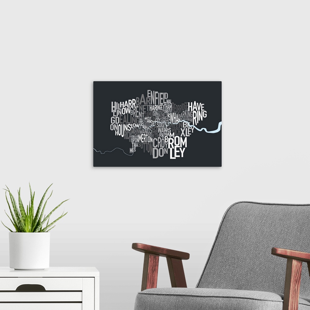 A modern room featuring A typographic map of the Boroughs of London, United Kingdom, in shades of grey on a charcoal grey...