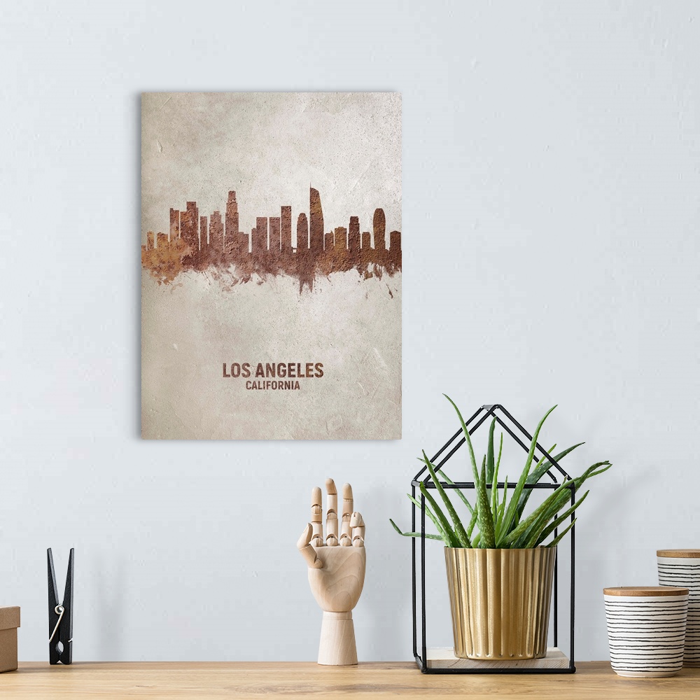A bohemian room featuring Art print of the skyline of Los Angeles, California, United States. Rust on concrete.