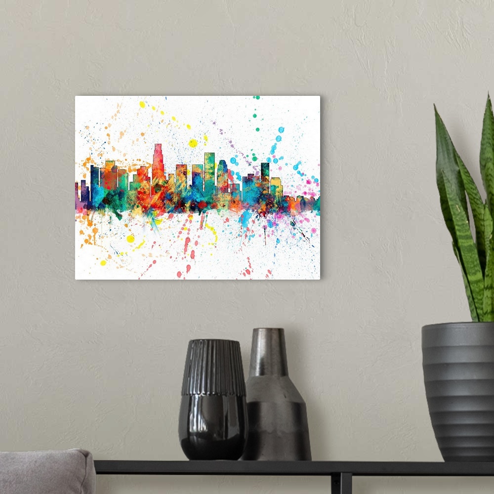 A modern room featuring Wild and vibrant paint splatter silhouette of the Los Angeles skyline.