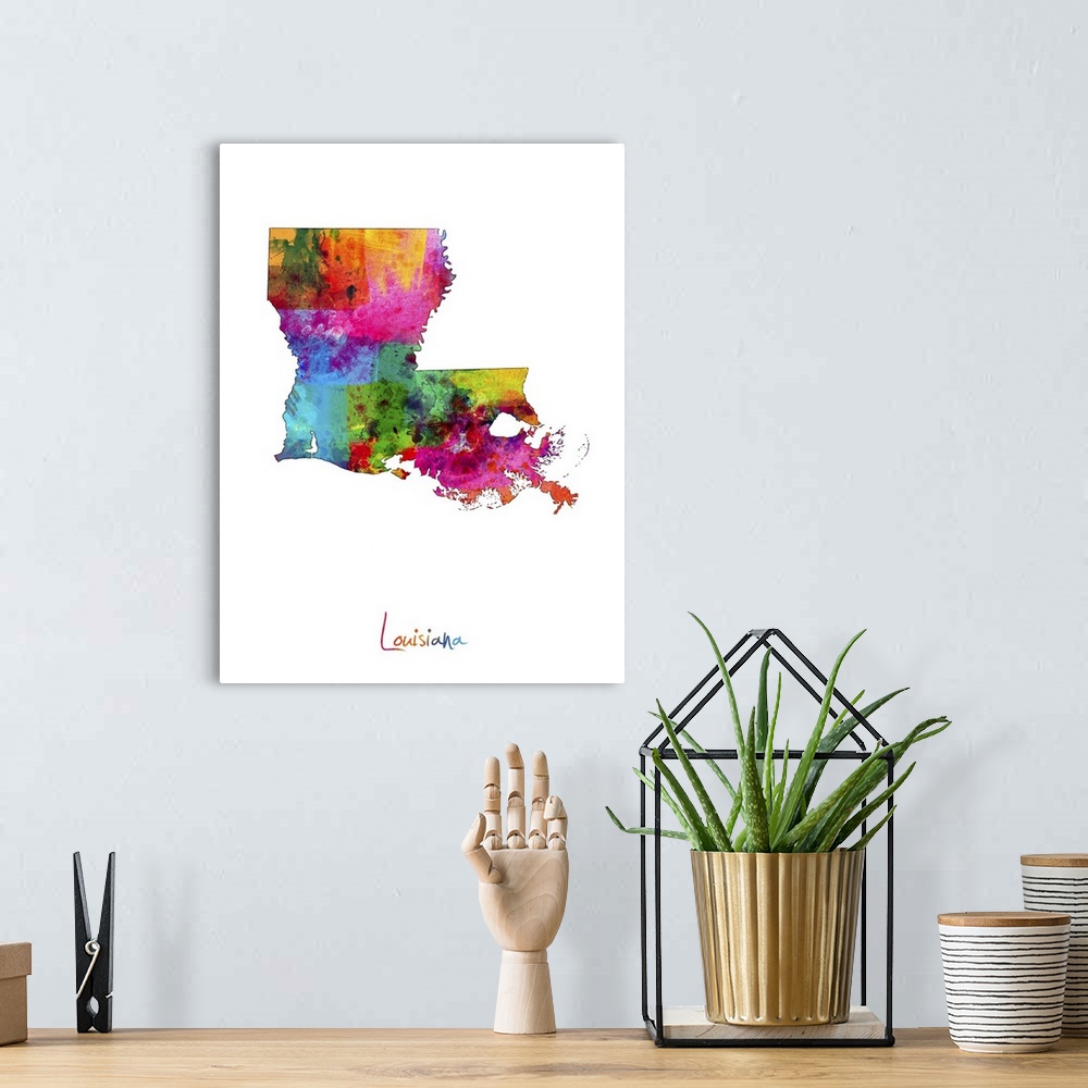 A bohemian room featuring Contemporary artwork of a map of Louisiana made of colorful paint splashes.