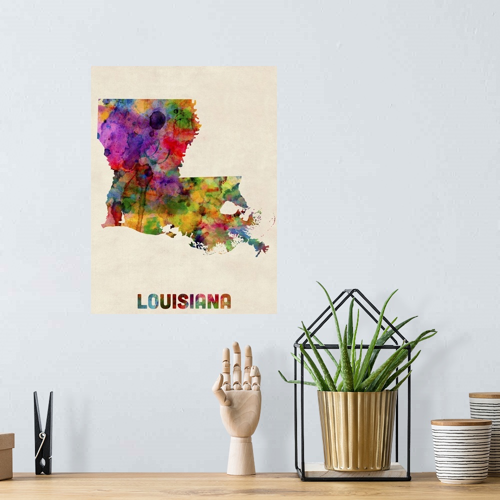 A bohemian room featuring Contemporary piece of artwork of a map of Louisiana made up of watercolor splashes.