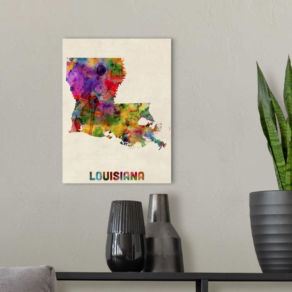 A modern room featuring Contemporary piece of artwork of a map of Louisiana made up of watercolor splashes.