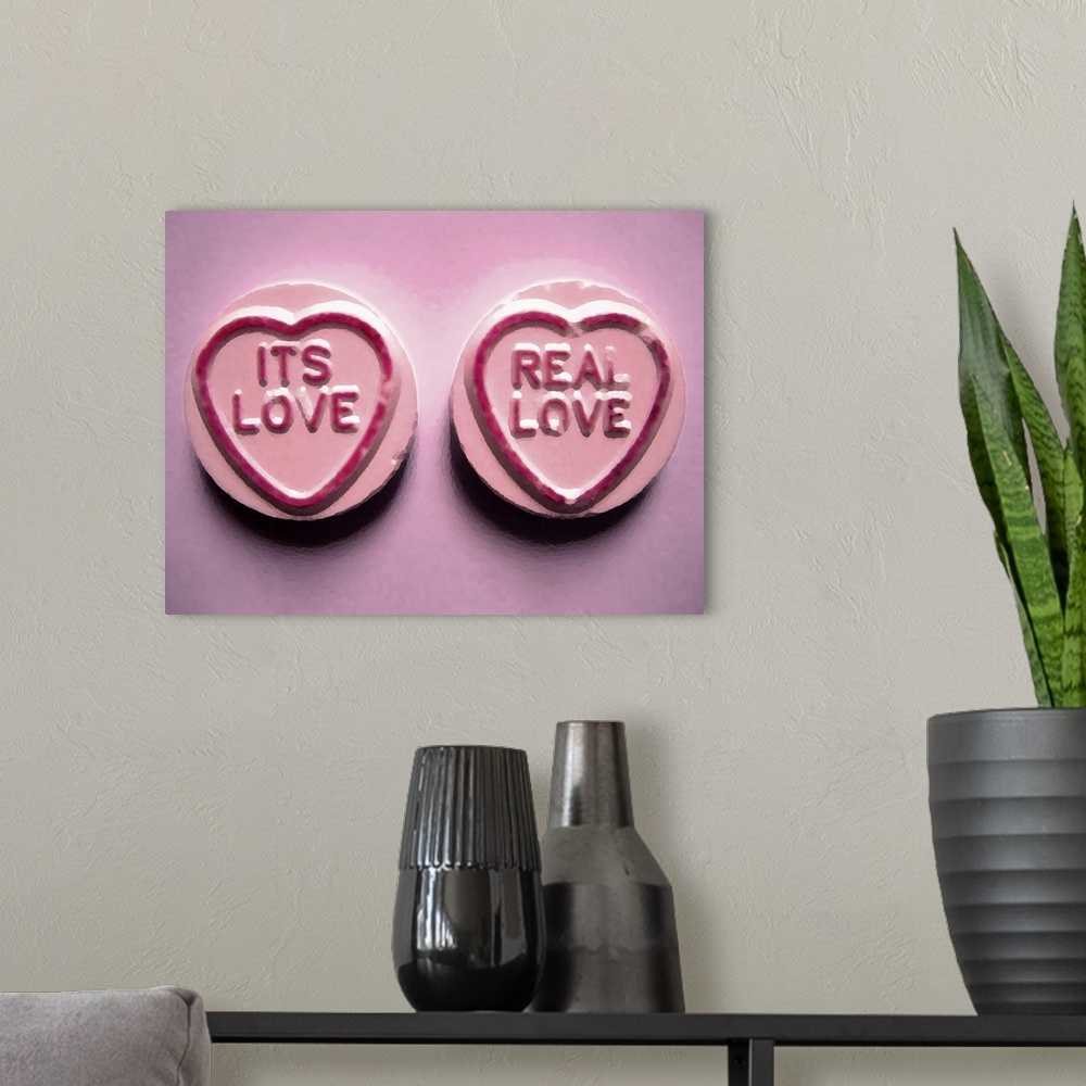 A modern room featuring Love Heart Sweets It's Love, Real Love in Pink.